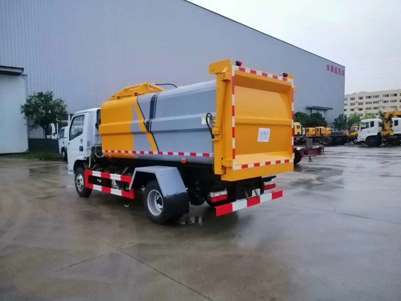 東風(fēng)牌5方6方側(cè)裝壓縮垃圾車(chē)