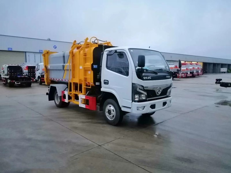 東風(fēng)牌5方6方側(cè)裝壓縮垃圾車(chē)